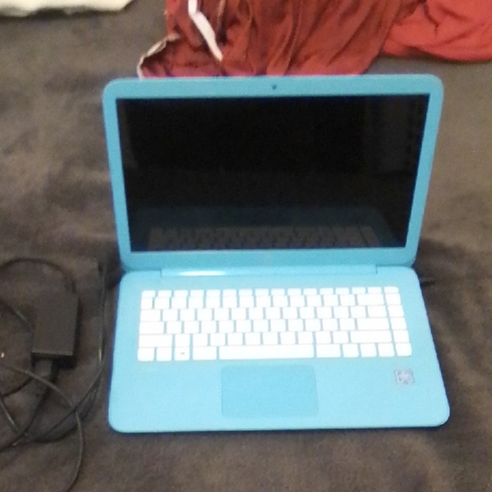 Blue Laptop with White Keyboard